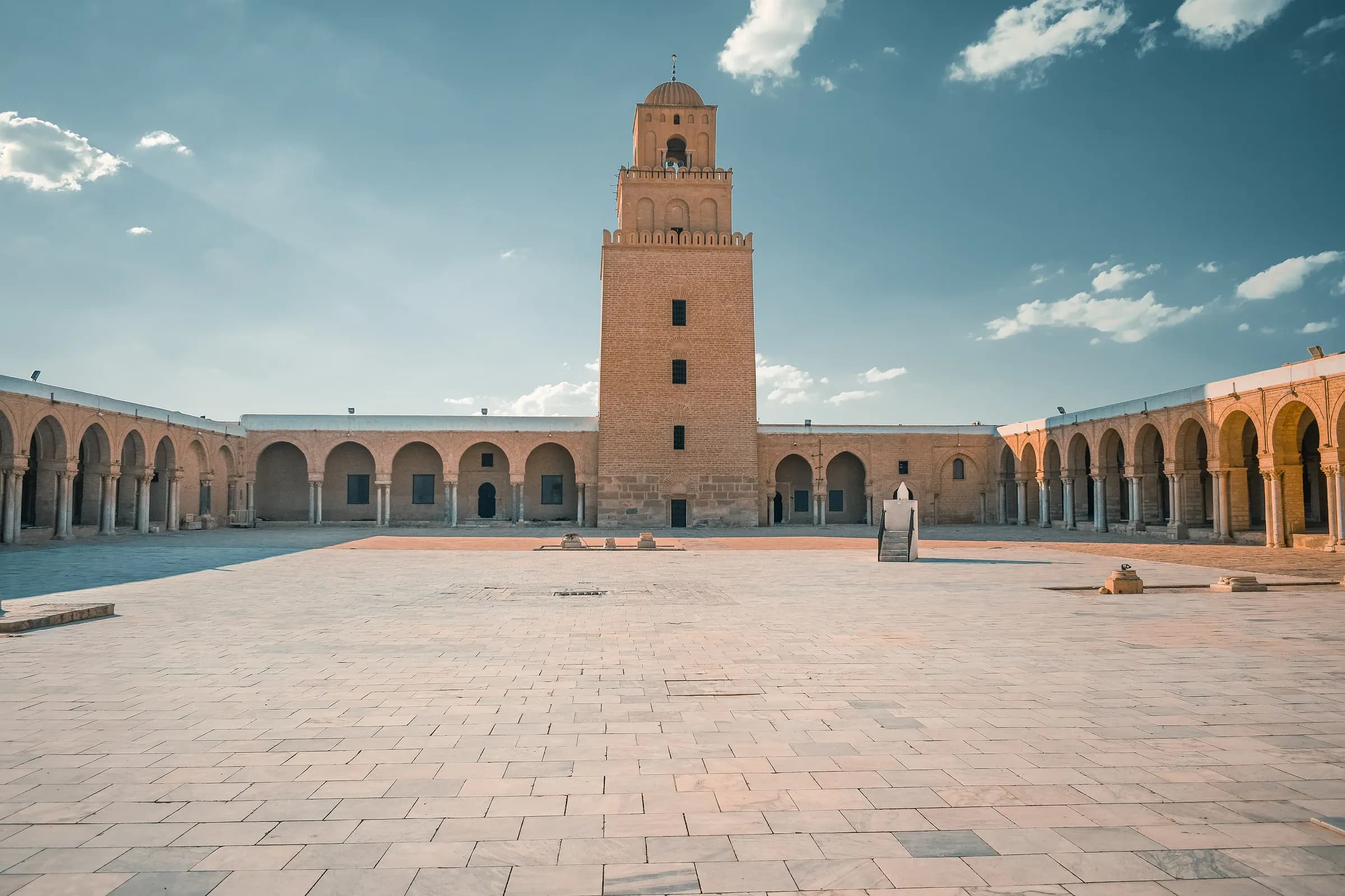 Marble courtyard and square minaret of the Great Mosque of Kairouan